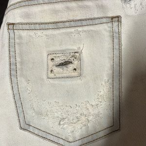 Dolce & Gabbana frayed ripped detailed denim jeans 26